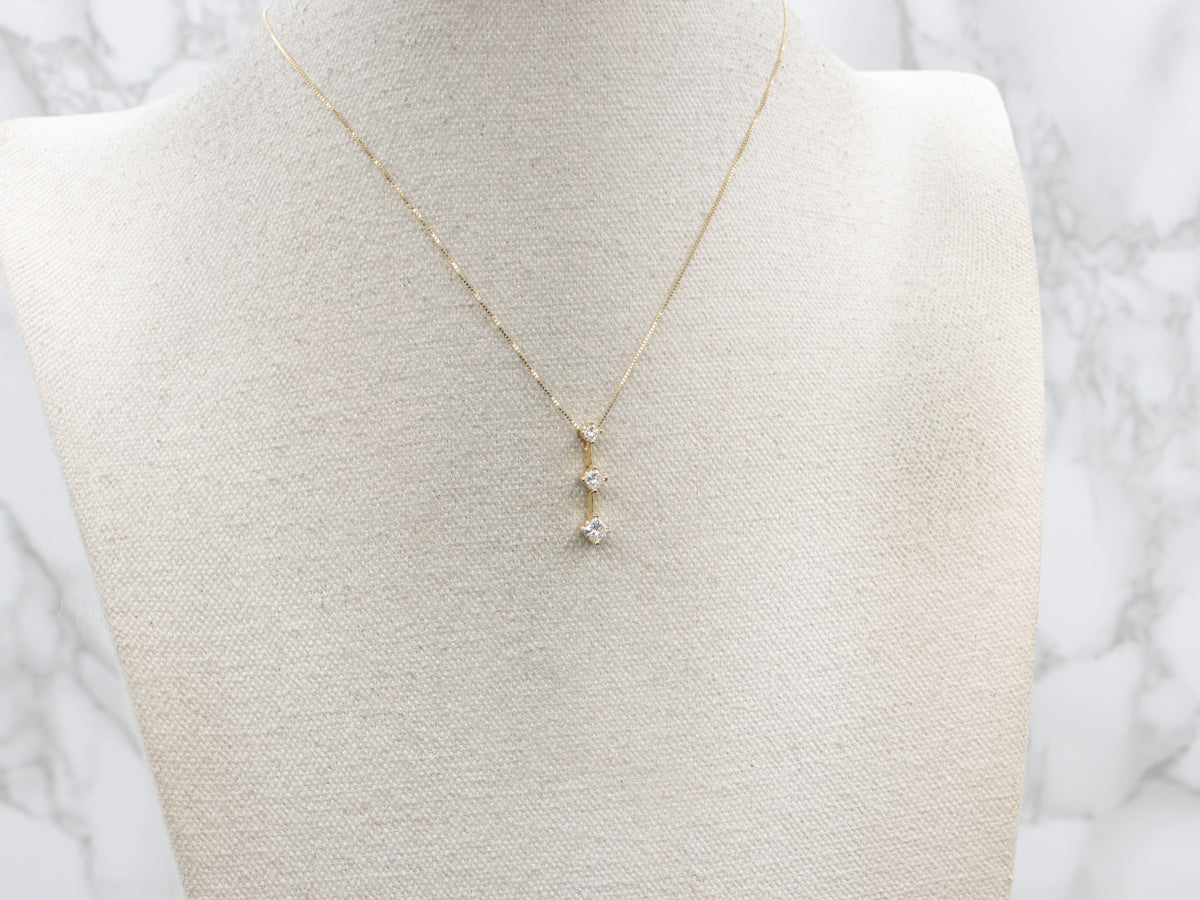 Graduated Princess Cut Diamond Drop Pendant with Hidden Bail