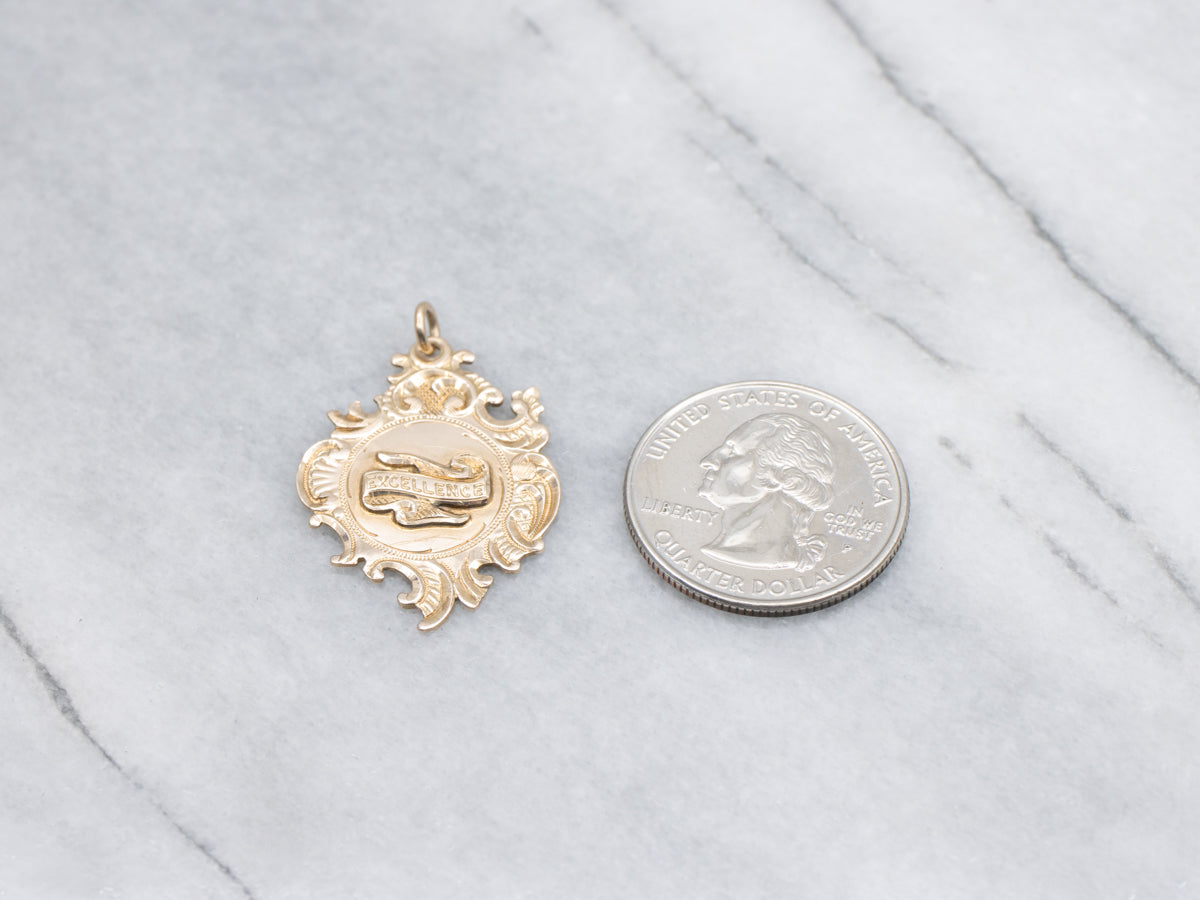 Antique 1912 Gold "Excellence" Medallion Pendant