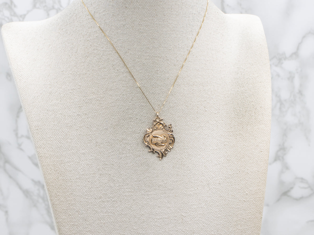 Antique 1912 Gold "Excellence" Medallion Pendant