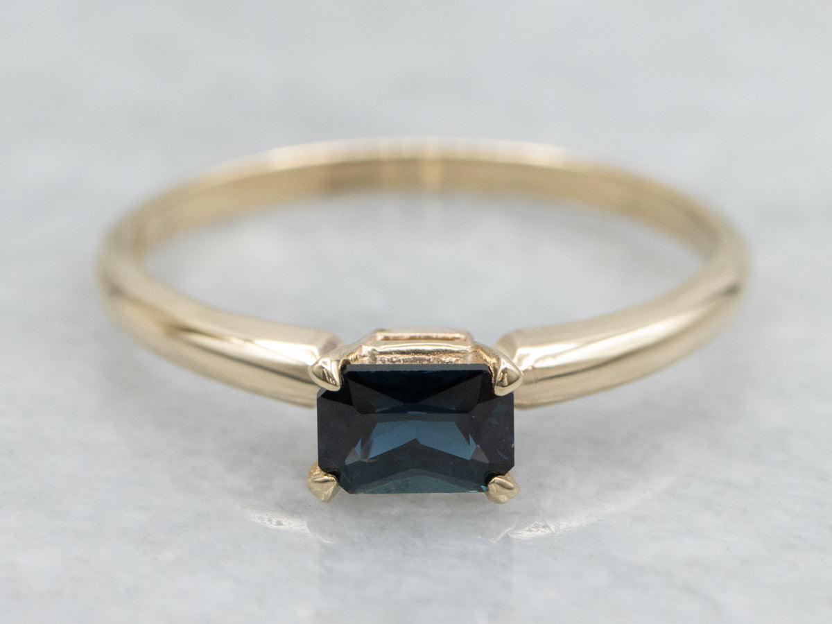 East-to-West Set Sapphire Yellow Gold Solitaire Ring