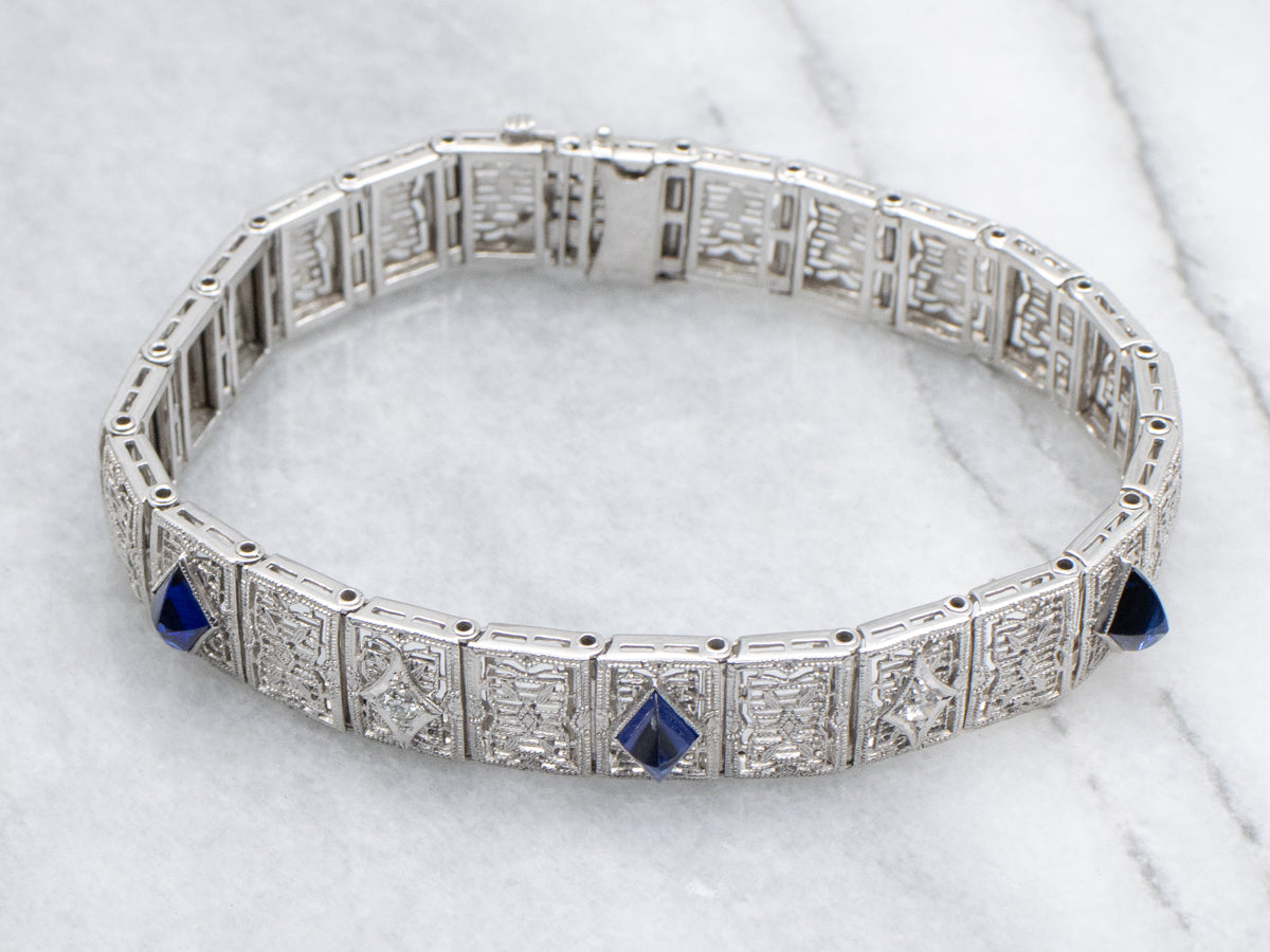 Circa 1920s Diamond and Synthetic Sapphire Gold Filigree Panel Bracelet