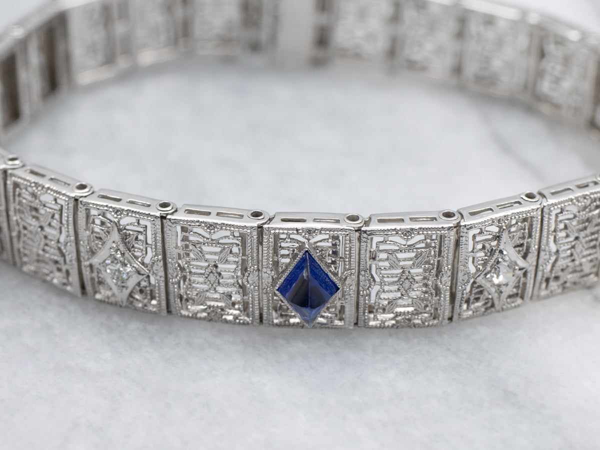 Circa 1920s Diamond and Synthetic Sapphire Gold Filigree Panel Bracelet