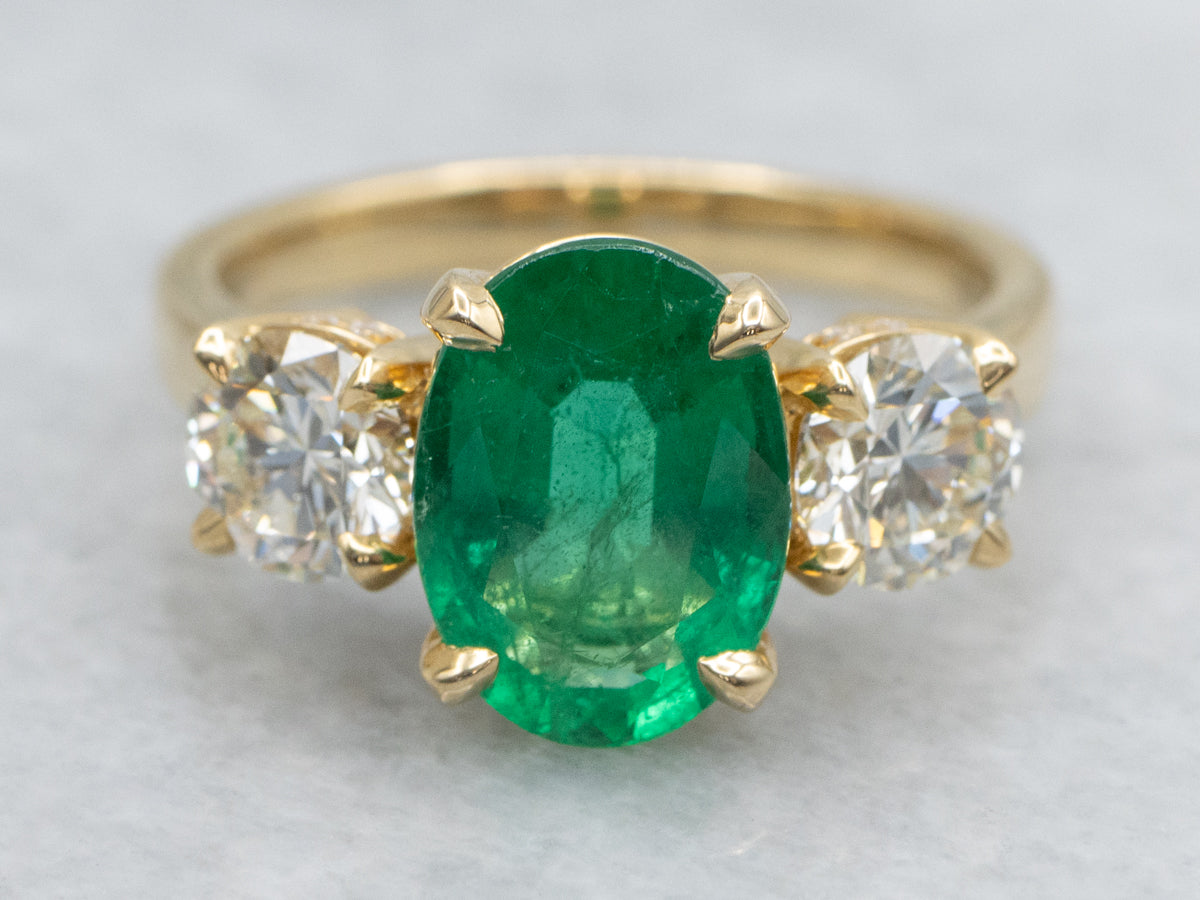 Modern 18-Karat Gold Emerald and Diamond Engagement Ring
