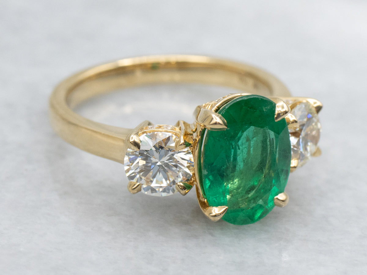 Modern 18-Karat Gold Emerald and Diamond Engagement Ring