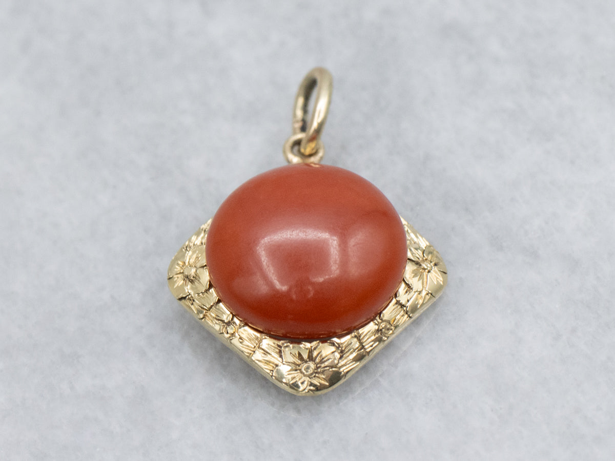Coral Cabochon and Engraved Gold Floral Pendant