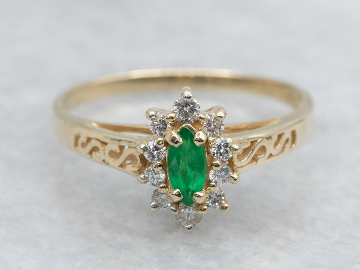 Marquise Cut Emerald and Diamond Halo Scrolling Gold Ring