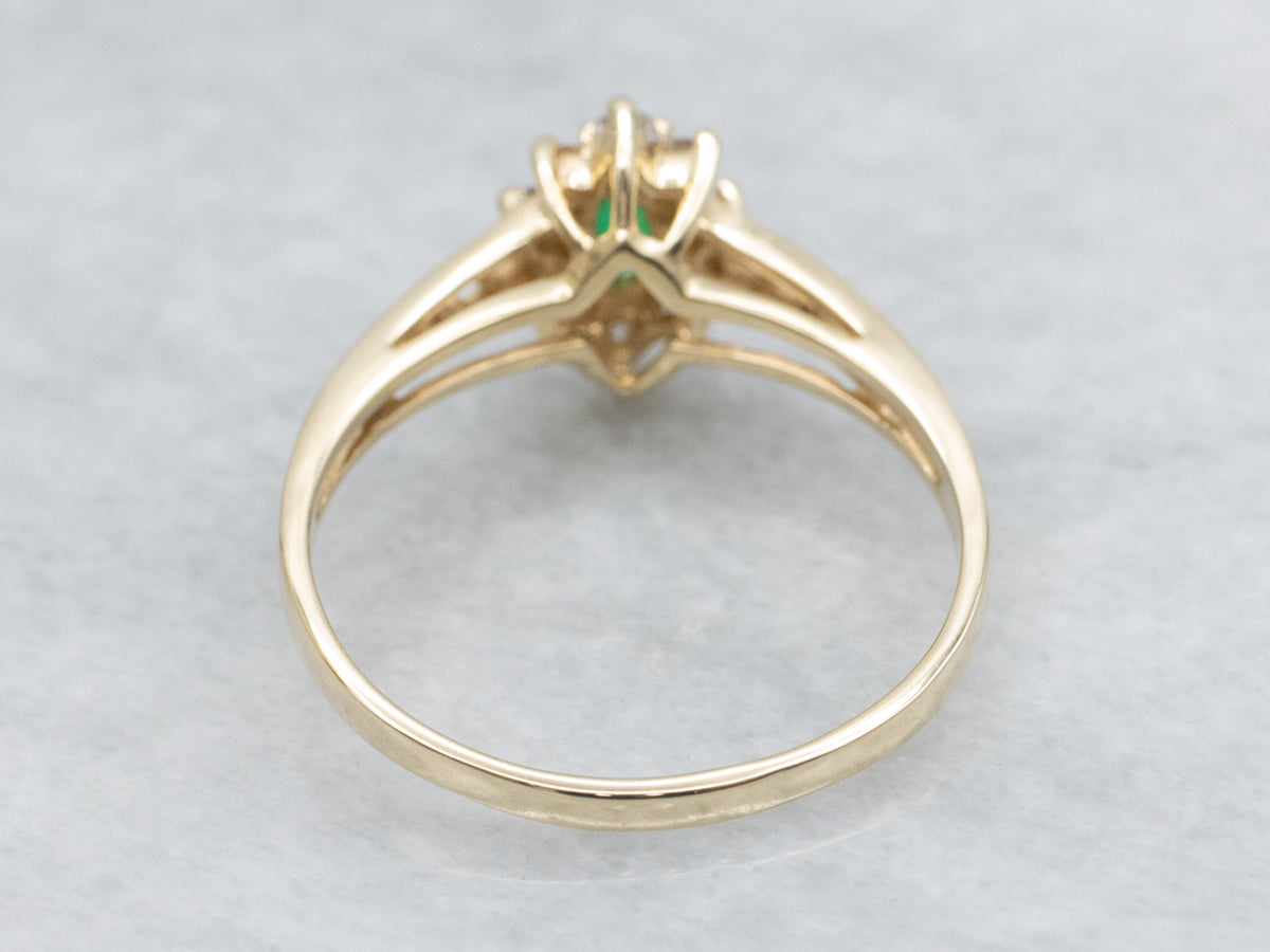 Marquise Cut Emerald and Diamond Halo Scrolling Gold Ring