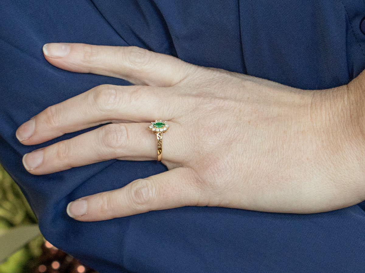 Marquise Cut Emerald and Diamond Halo Scrolling Gold Ring