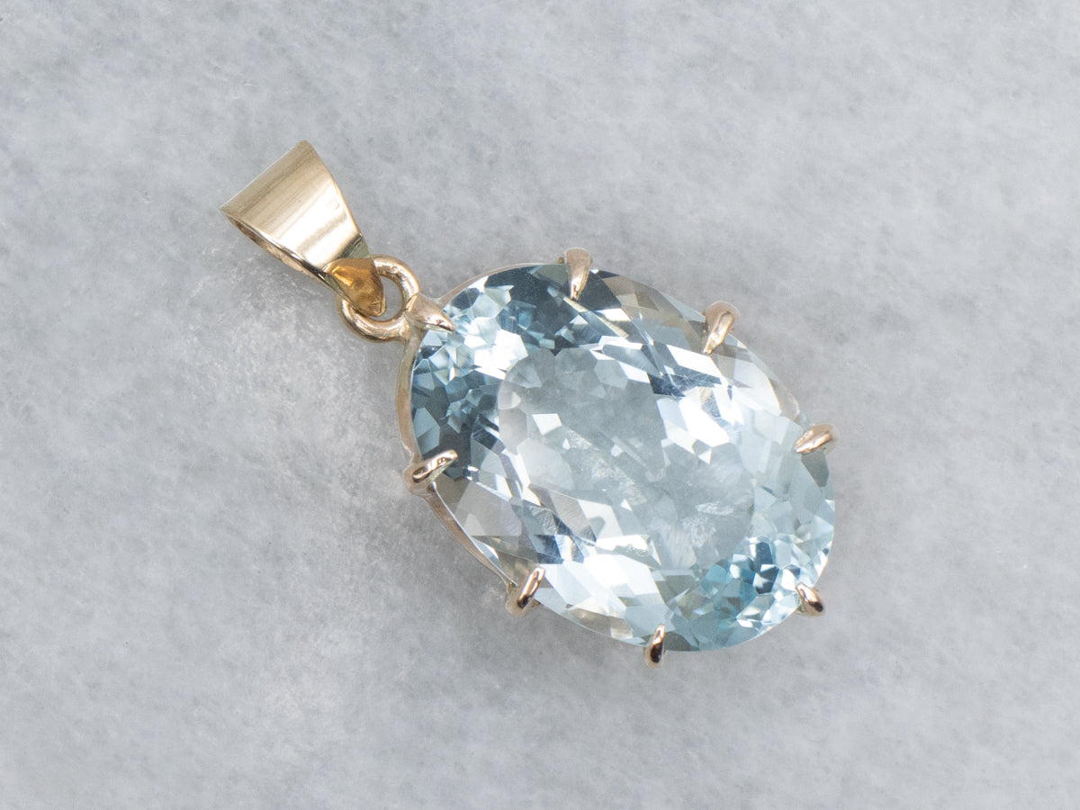 Oval-Cut Aquamarine Yellow Gold Solitaire Pendant