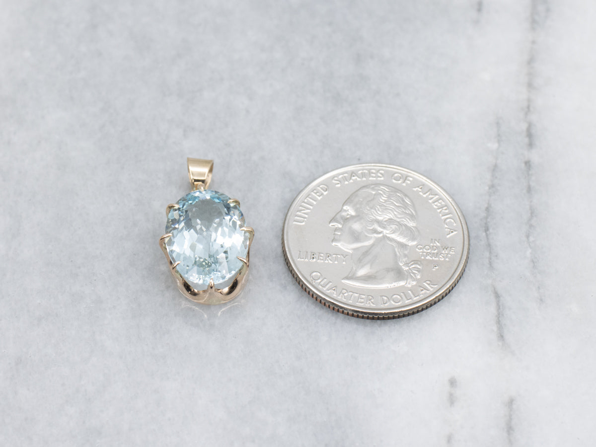 Oval-Cut Aquamarine Yellow Gold Solitaire Pendant