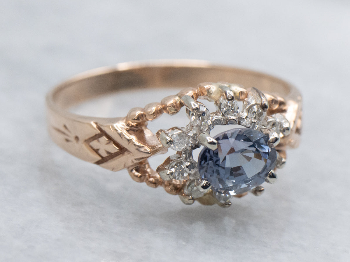 Unique East-West Set Purple Spinel and Diamond Halo Ring