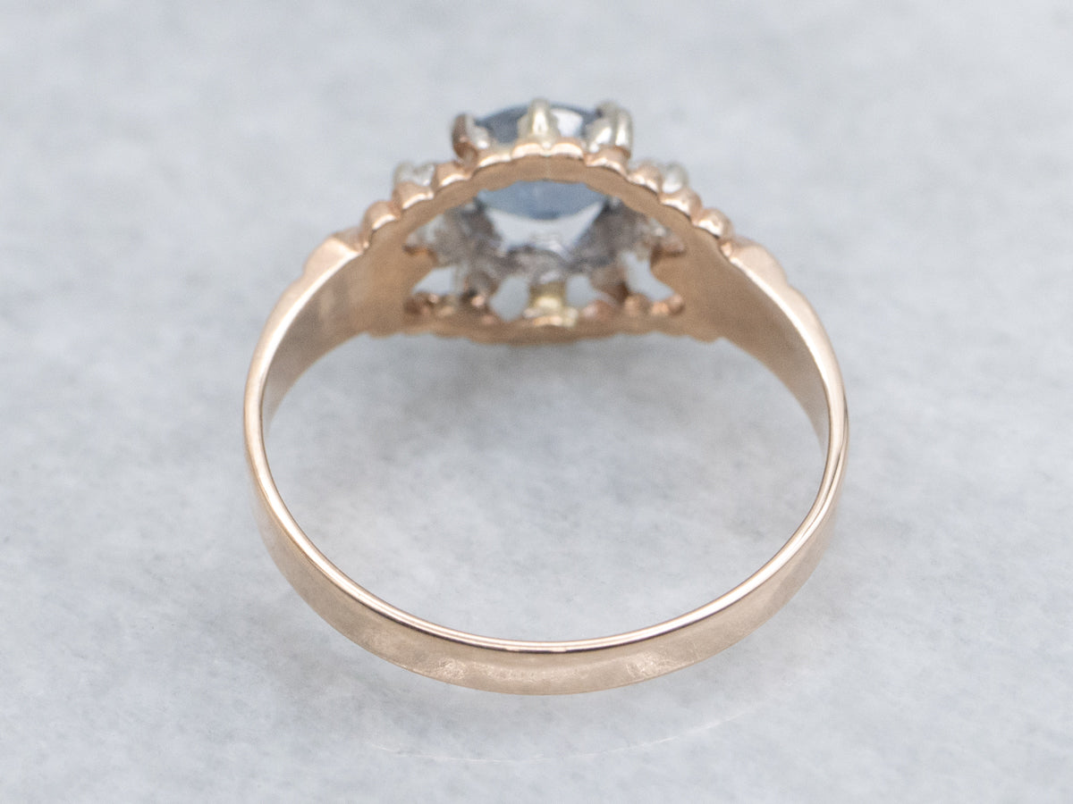 Unique East-West Set Purple Spinel and Diamond Halo Ring