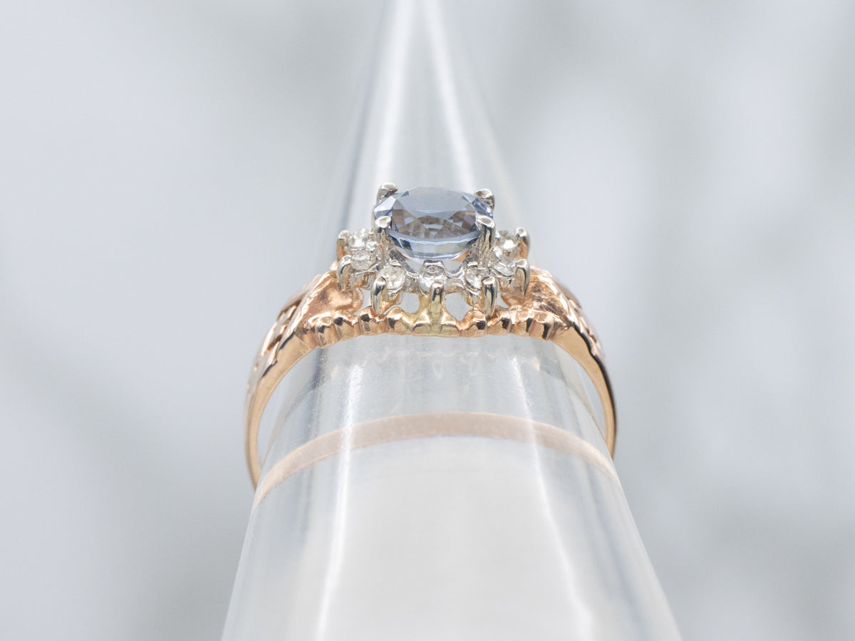 Unique East-West Set Purple Spinel and Diamond Halo Ring