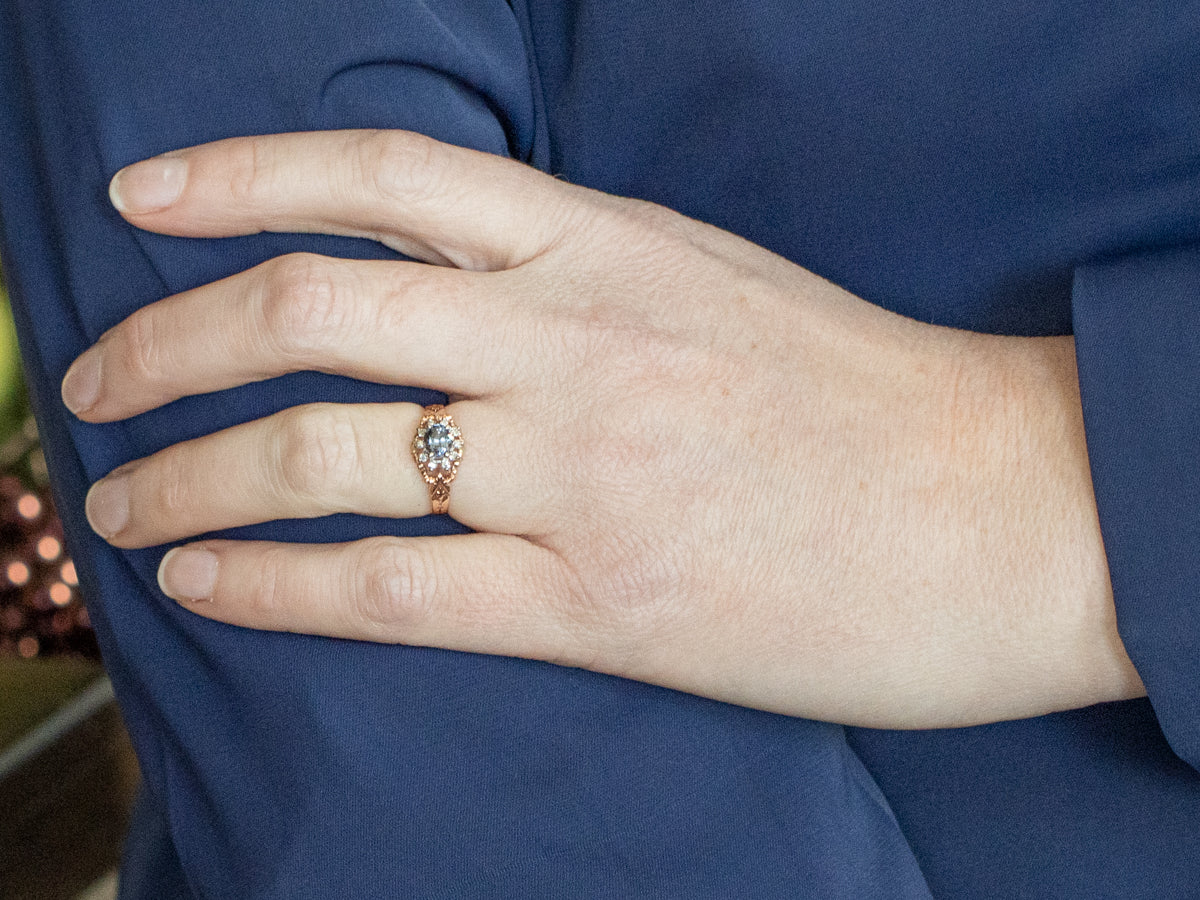 Unique East-West Set Purple Spinel and Diamond Halo Ring