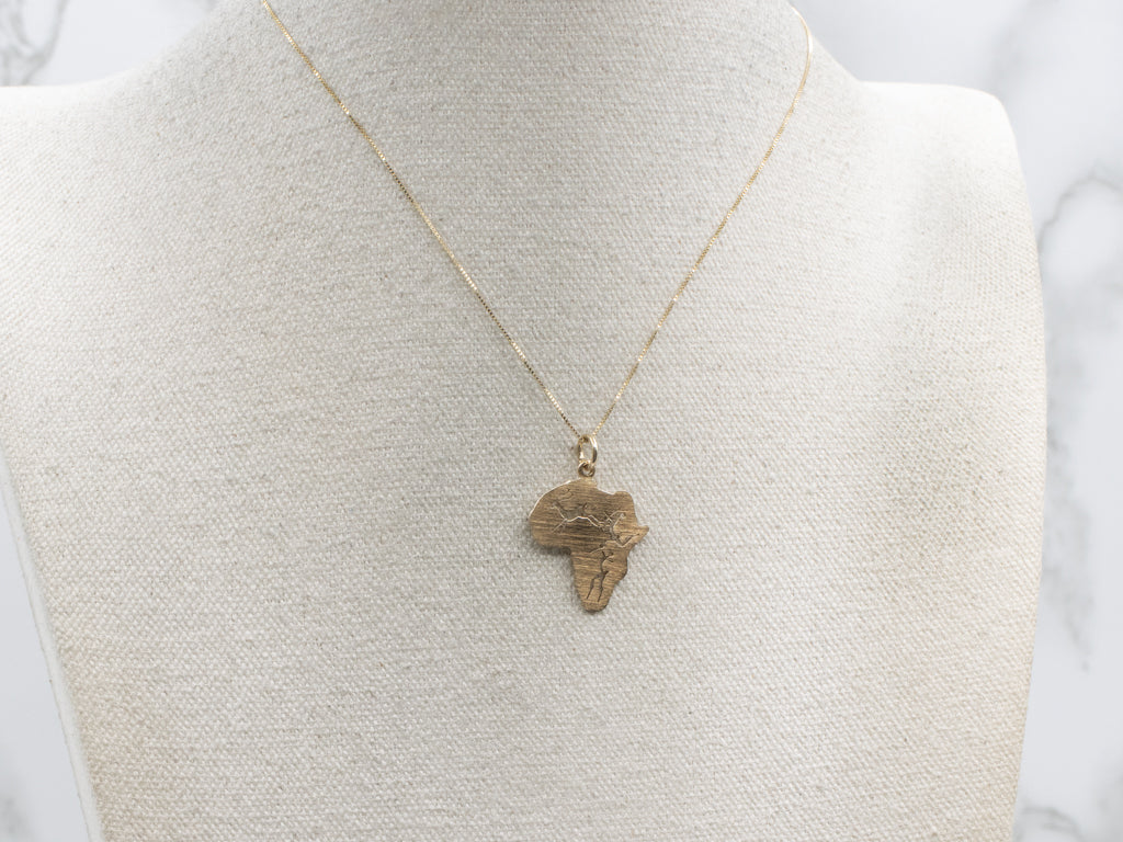 African Continent Hunter and Antelope Pendant in Gold