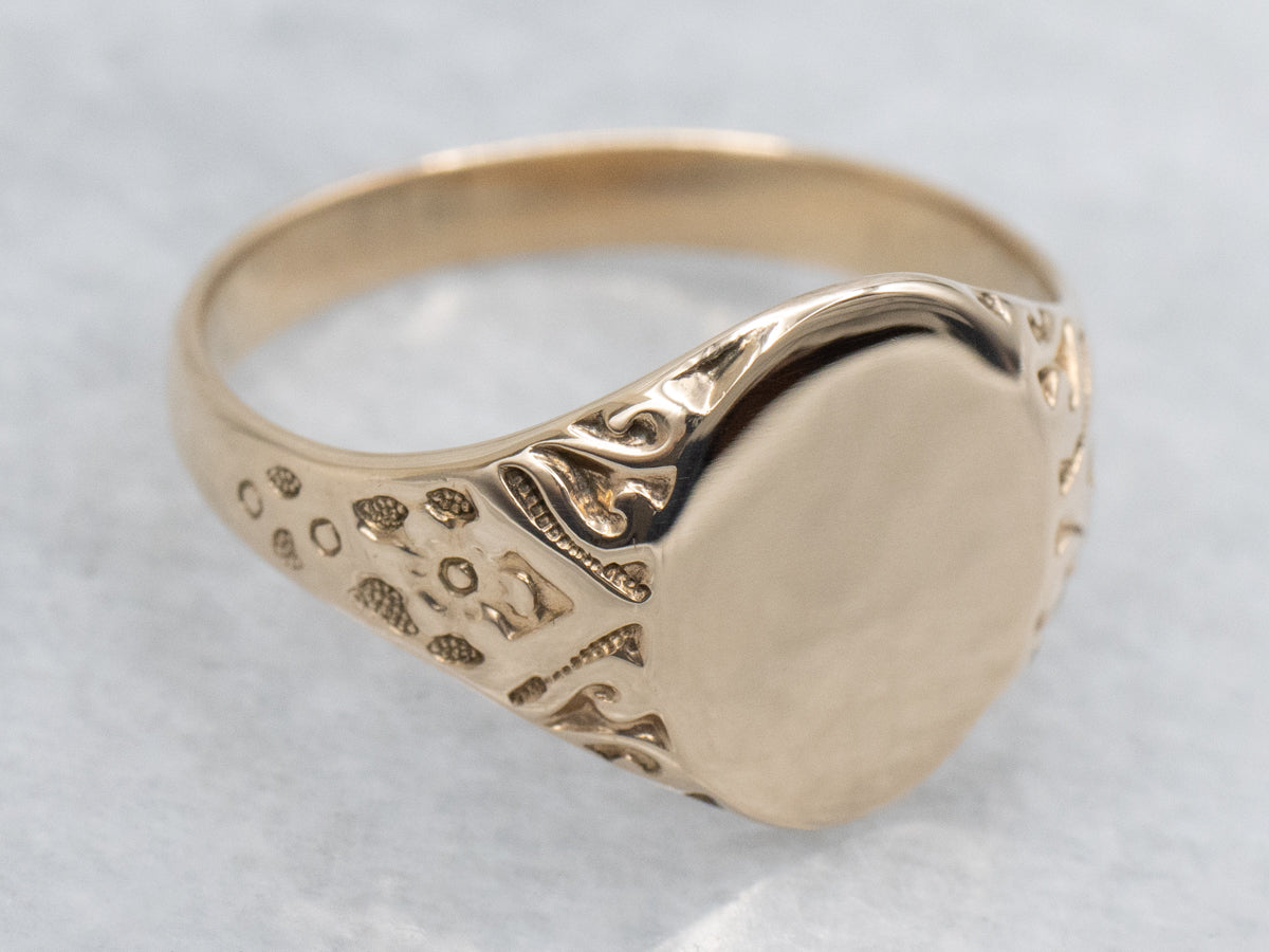 Antique Gold Signet Ring with Ornately Carved Floral Shoulders