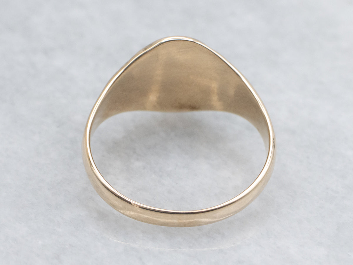 Antique Gold Signet Ring with Ornately Carved Floral Shoulders
