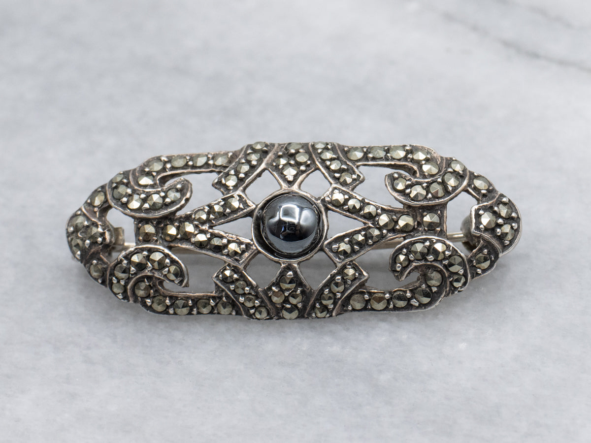 1920s Sterling Silver Hematite and Marcasite Flourish Brooch