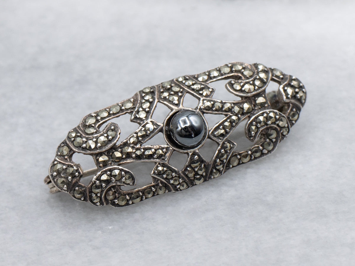 1920s Sterling Silver Hematite and Marcasite Flourish Brooch