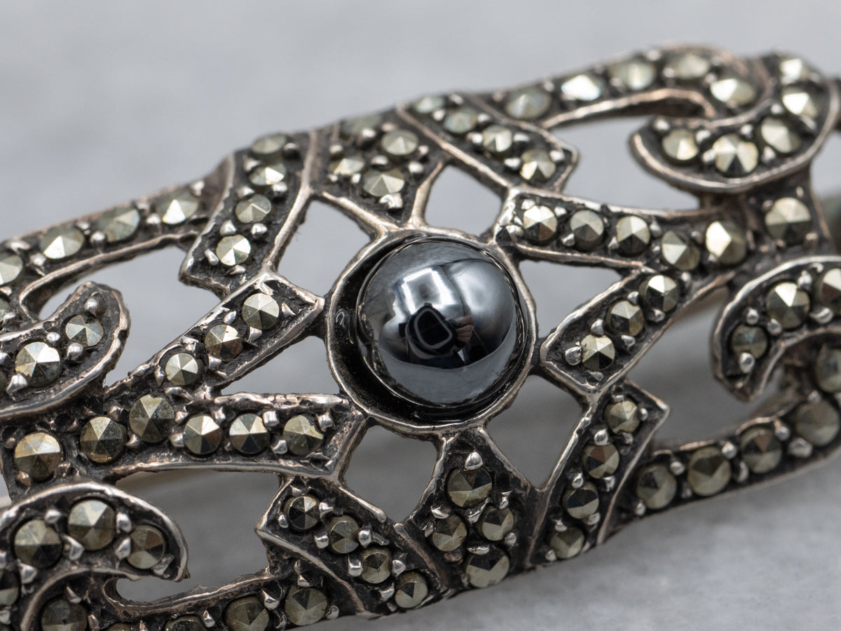 1920s Sterling Silver Hematite and Marcasite Flourish Brooch