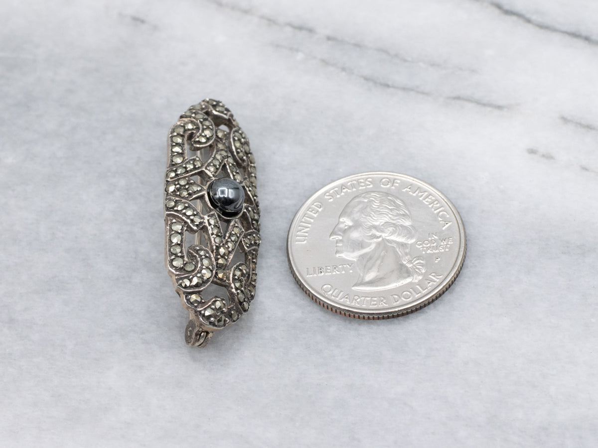 1920s Sterling Silver Hematite and Marcasite Flourish Brooch