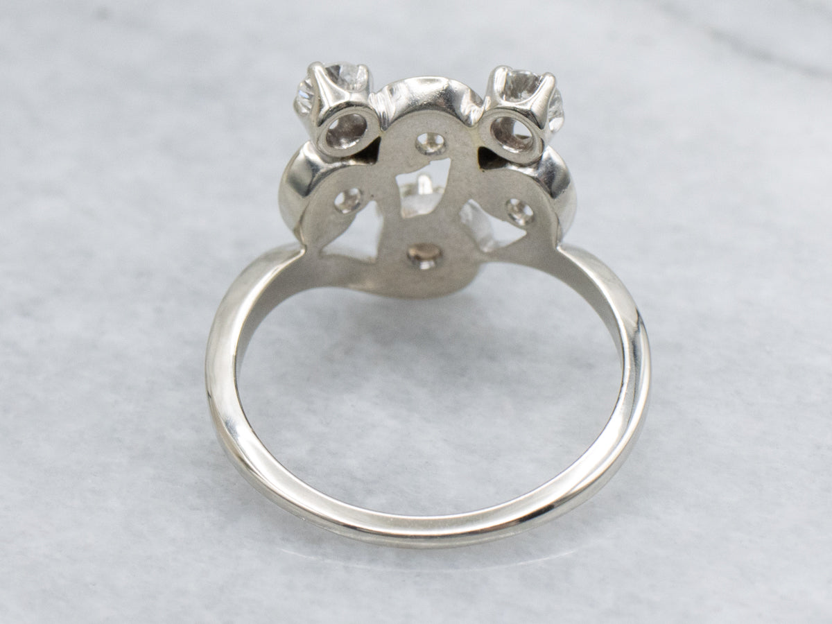 Swirling Gold and Sparkling Diamond Ring