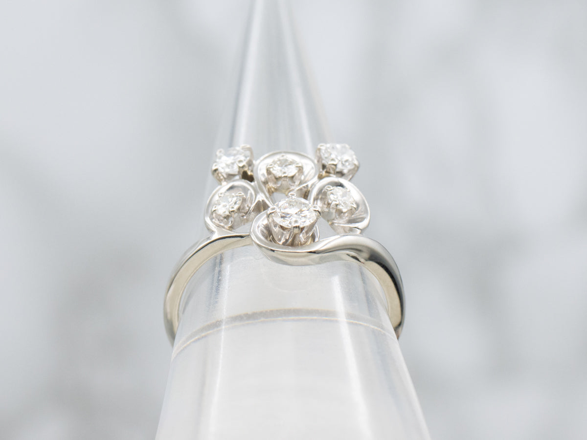 Swirling Gold and Sparkling Diamond Ring