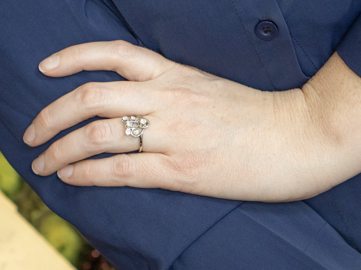 Swirling Gold and Sparkling Diamond Ring