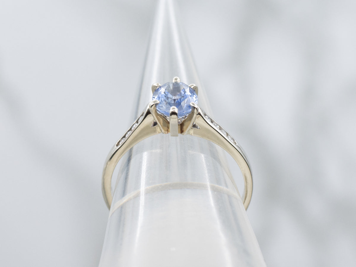 Sapphire White Gold Ring with Channel-Set Diamond Accents