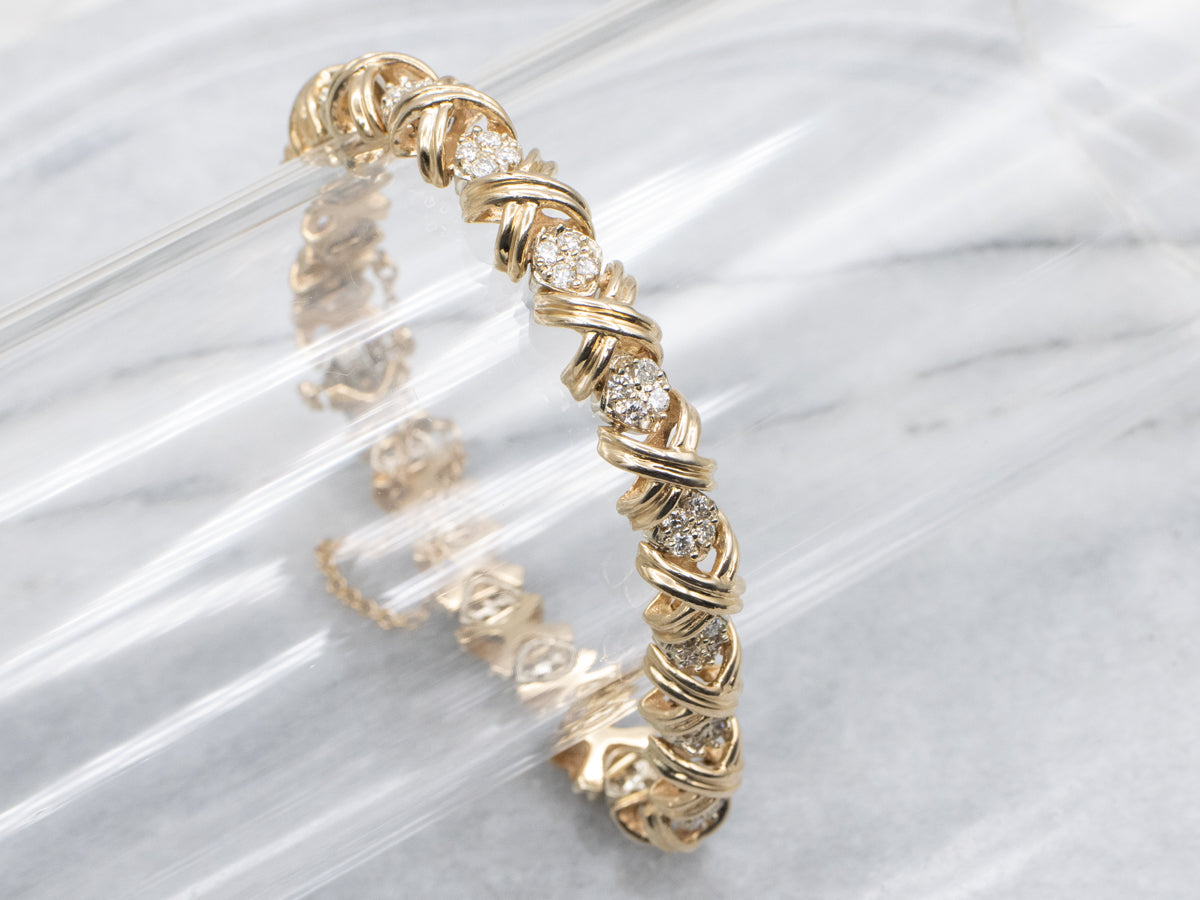 Criss-Cross Gold and Diamond Link Bracelet with Safety Chain