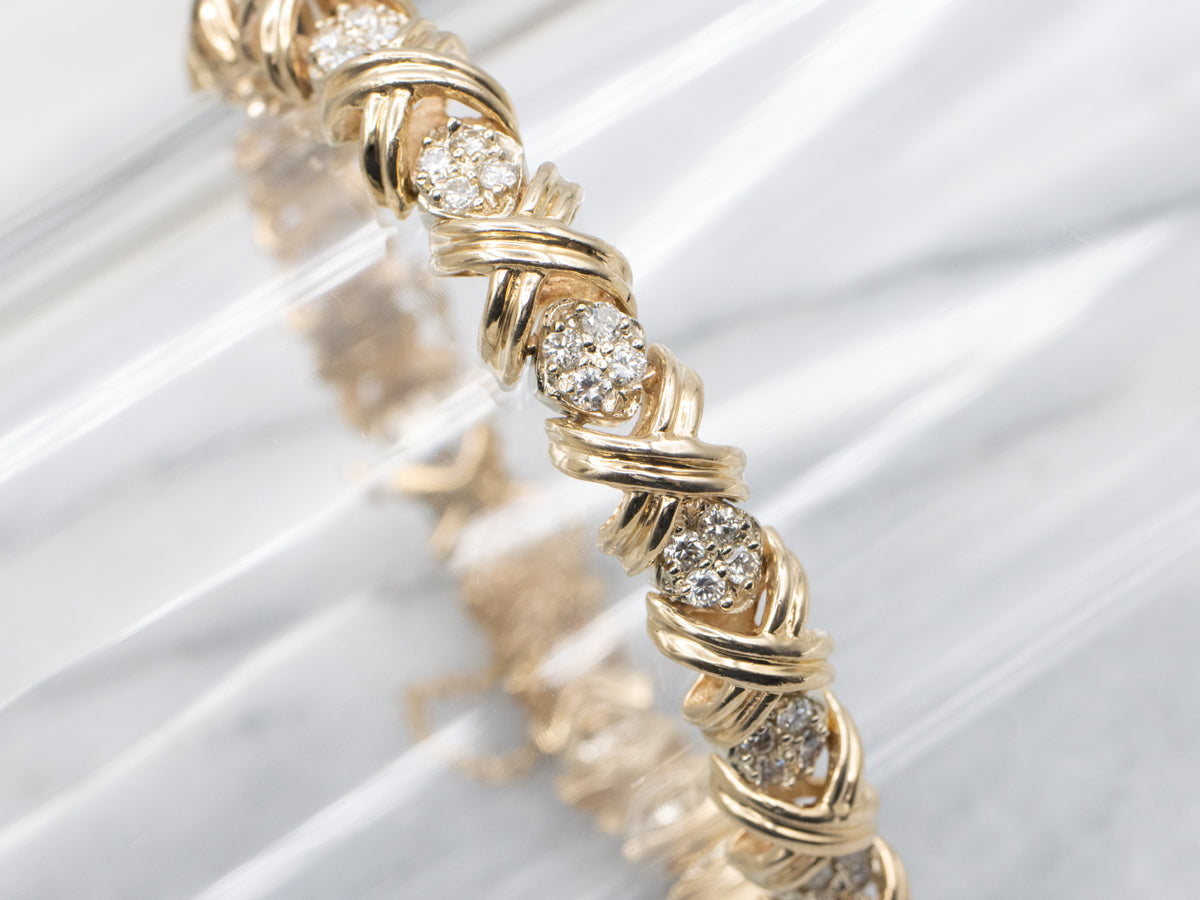 Criss-Cross Gold and Diamond Link Bracelet with Safety Chain