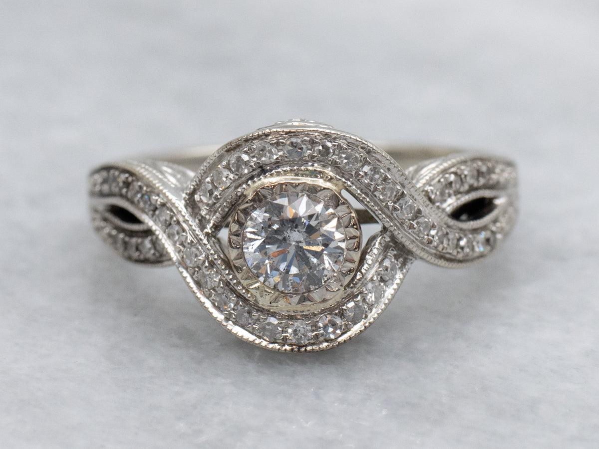 Twisting Round Brilliant Diamond Engagement Ring