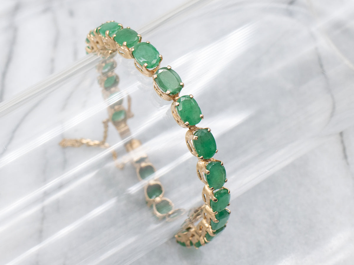 Yellow Gold and Emerald Gemstone Tennis Bracelet