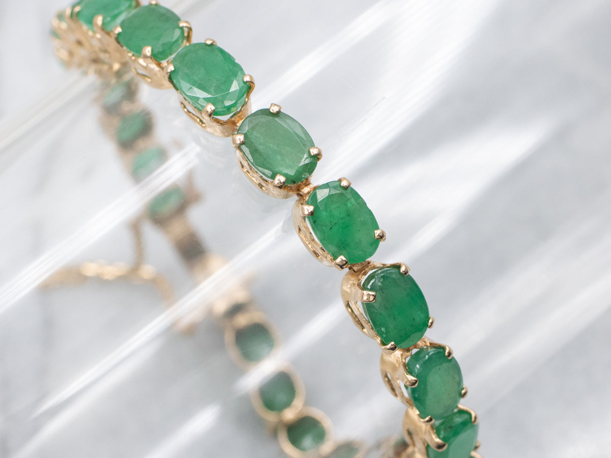 Yellow Gold and Emerald Gemstone Tennis Bracelet