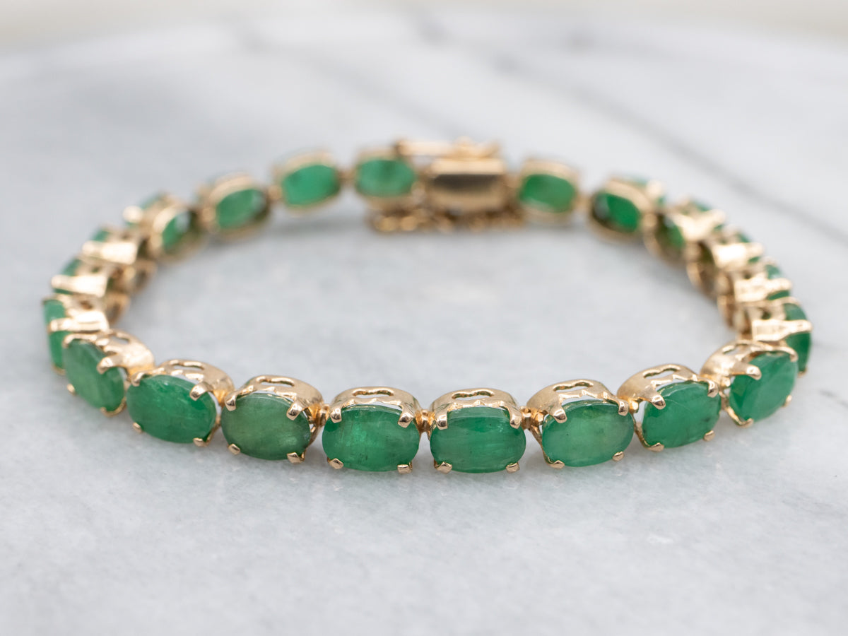 Yellow Gold and Emerald Gemstone Tennis Bracelet
