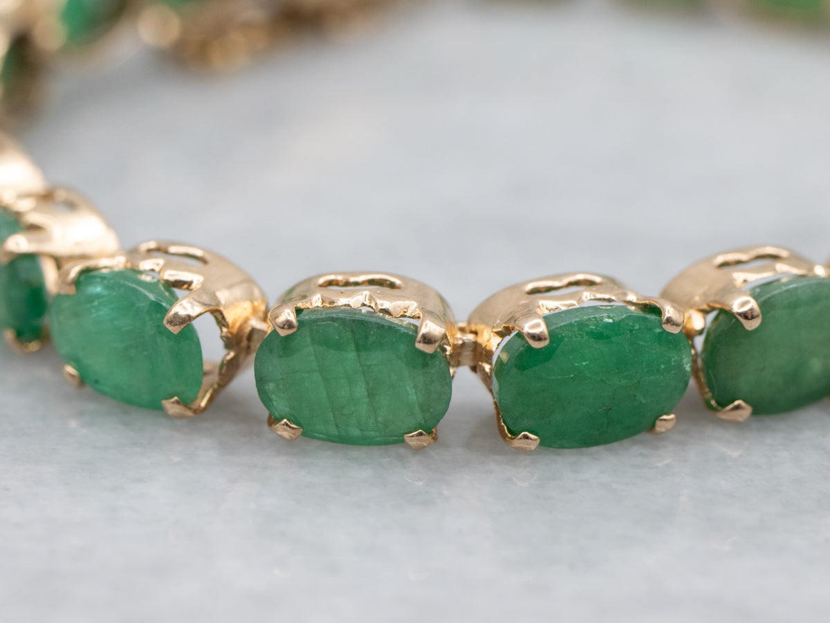 Yellow Gold and Emerald Gemstone Tennis Bracelet