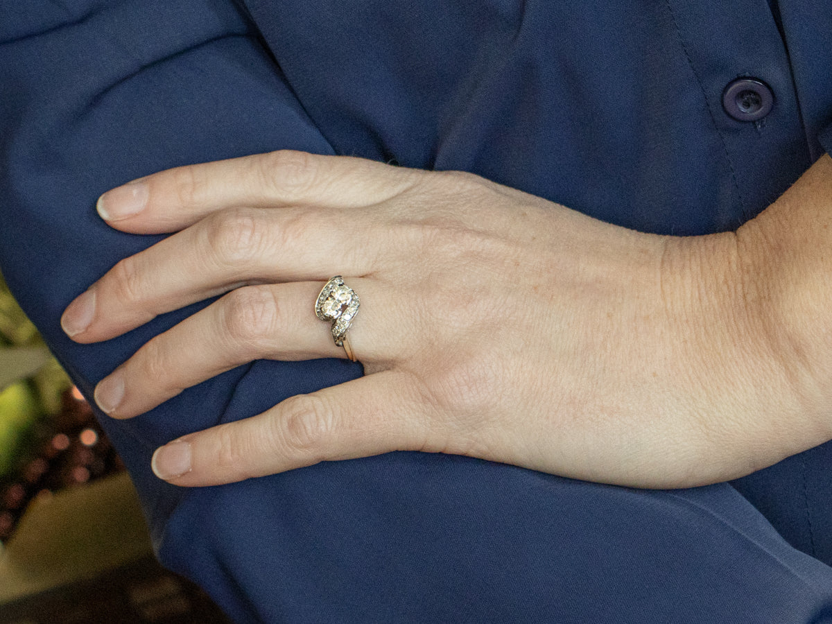 Double Diamond and Twisting Diamond Accent Two Tone Engagement Ring