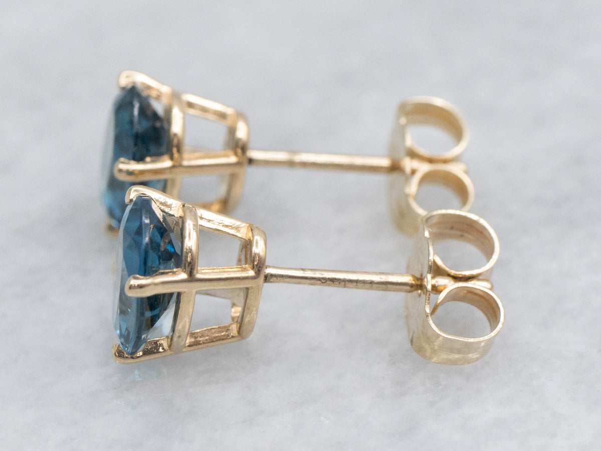 Oval-Cut Blue Topaz Yellow Gold Stud Earrings