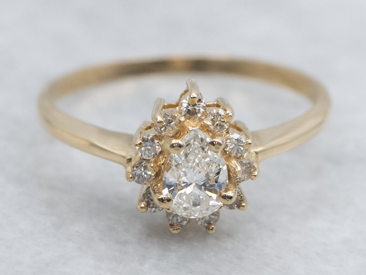 Modern Gold Pear-Cut Diamond Halo Engagement Ring