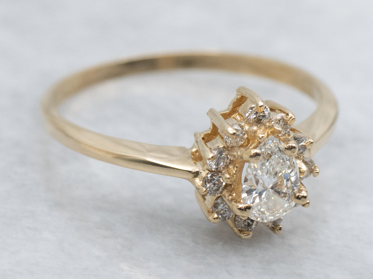 Modern Gold Pear-Cut Diamond Halo Engagement Ring