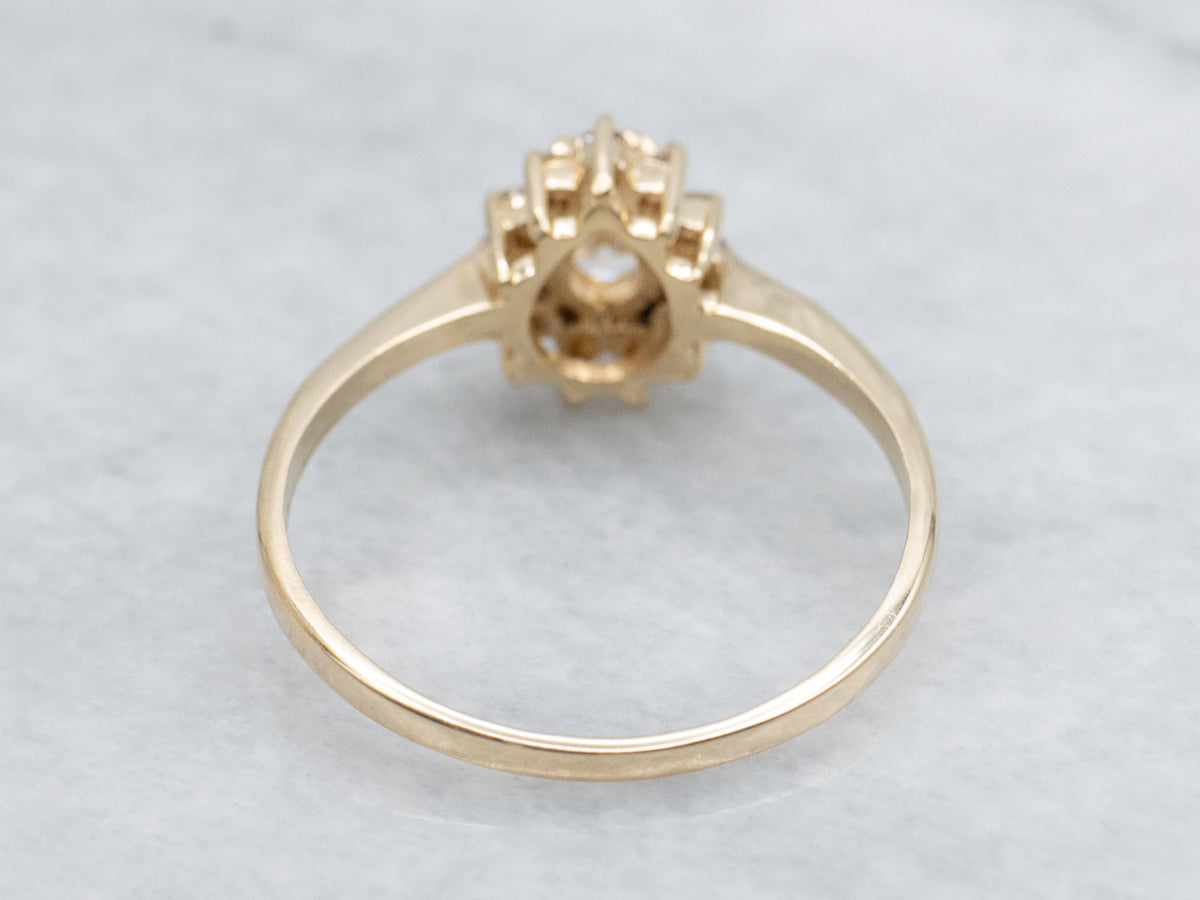 Modern Gold Pear-Cut Diamond Halo Engagement Ring