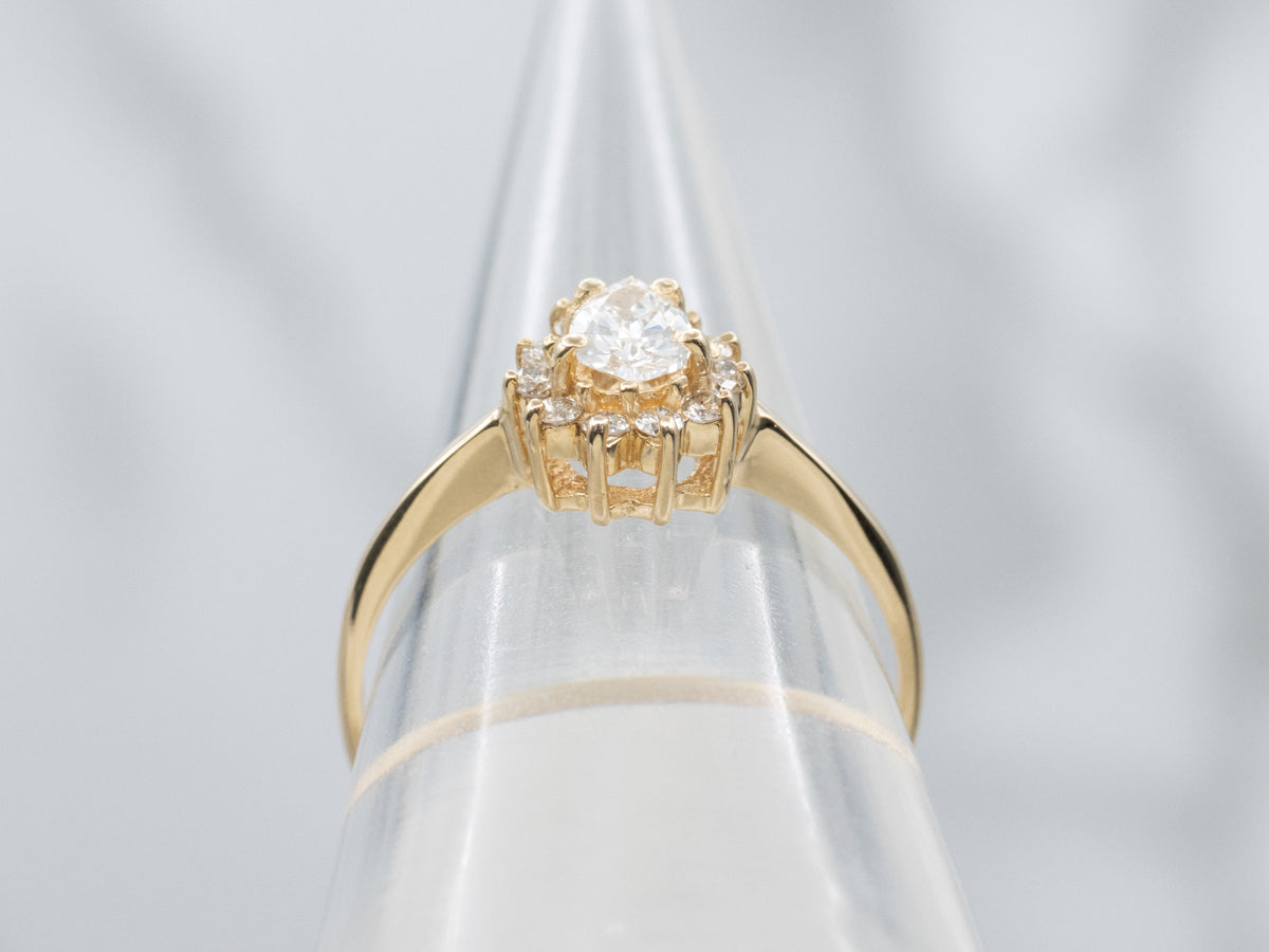 Modern Gold Pear-Cut Diamond Halo Engagement Ring