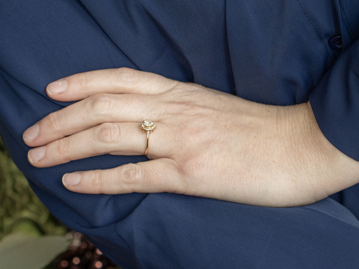 Modern Gold Pear-Cut Diamond Halo Engagement Ring