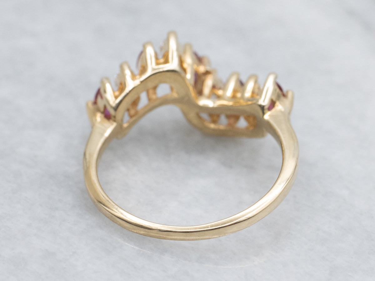 Marquise-Cut Diamond and Ruby Scrolling Gold Band