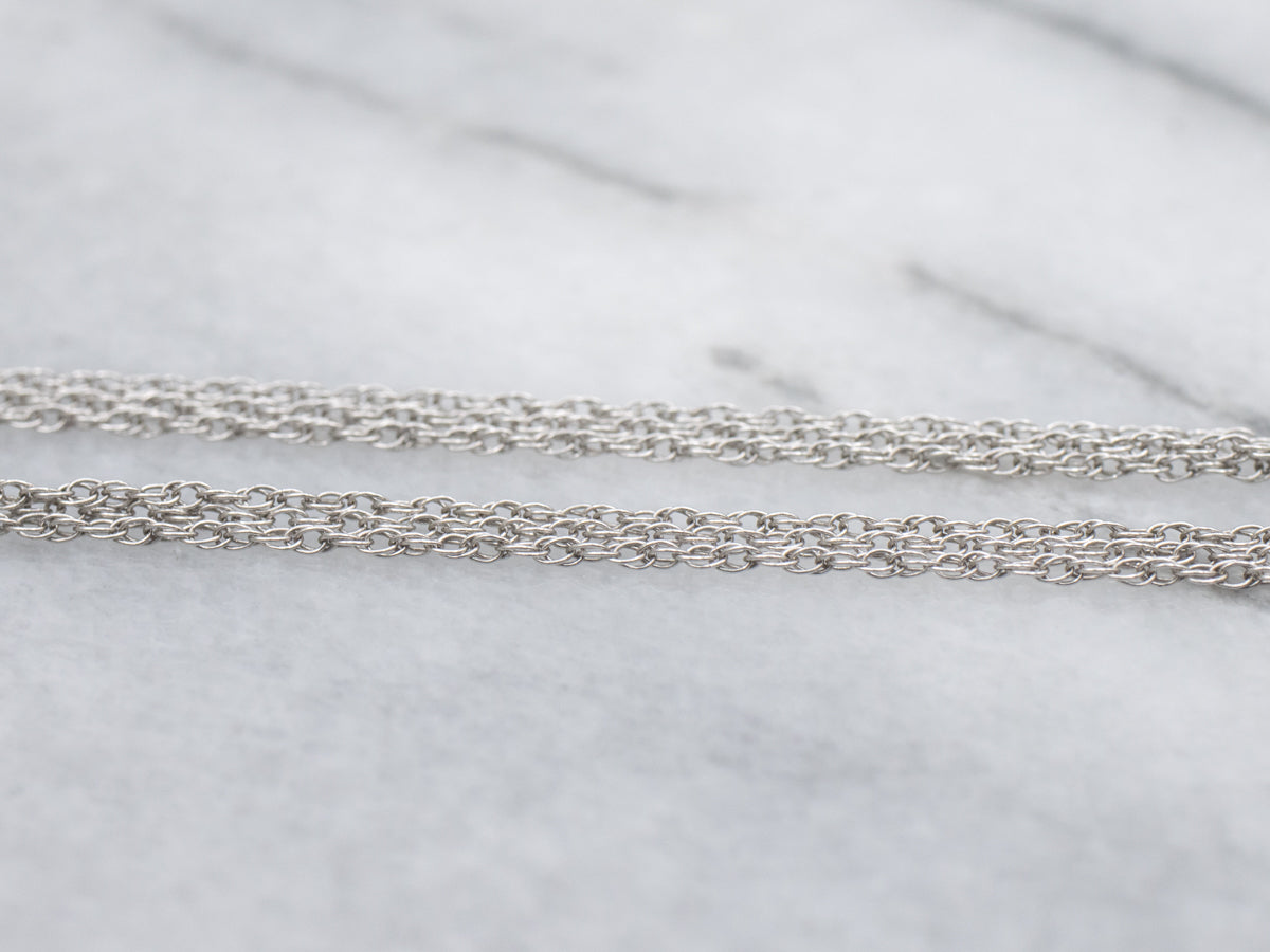 Sweet Diamond Flower Pendant on Triple Strand Necklace