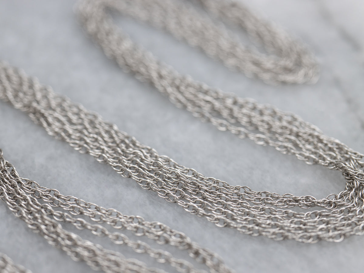 Sweet Diamond Flower Pendant on Triple Strand Necklace