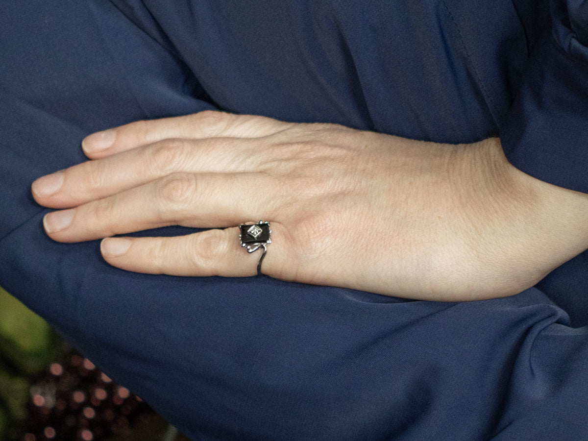 Retro Black Onyx and Diamond White Gold Bypass Ring