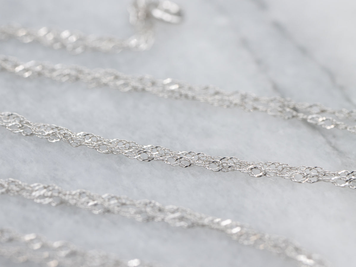 Modern White Gold Sapphire and Diamond Pendant Necklace