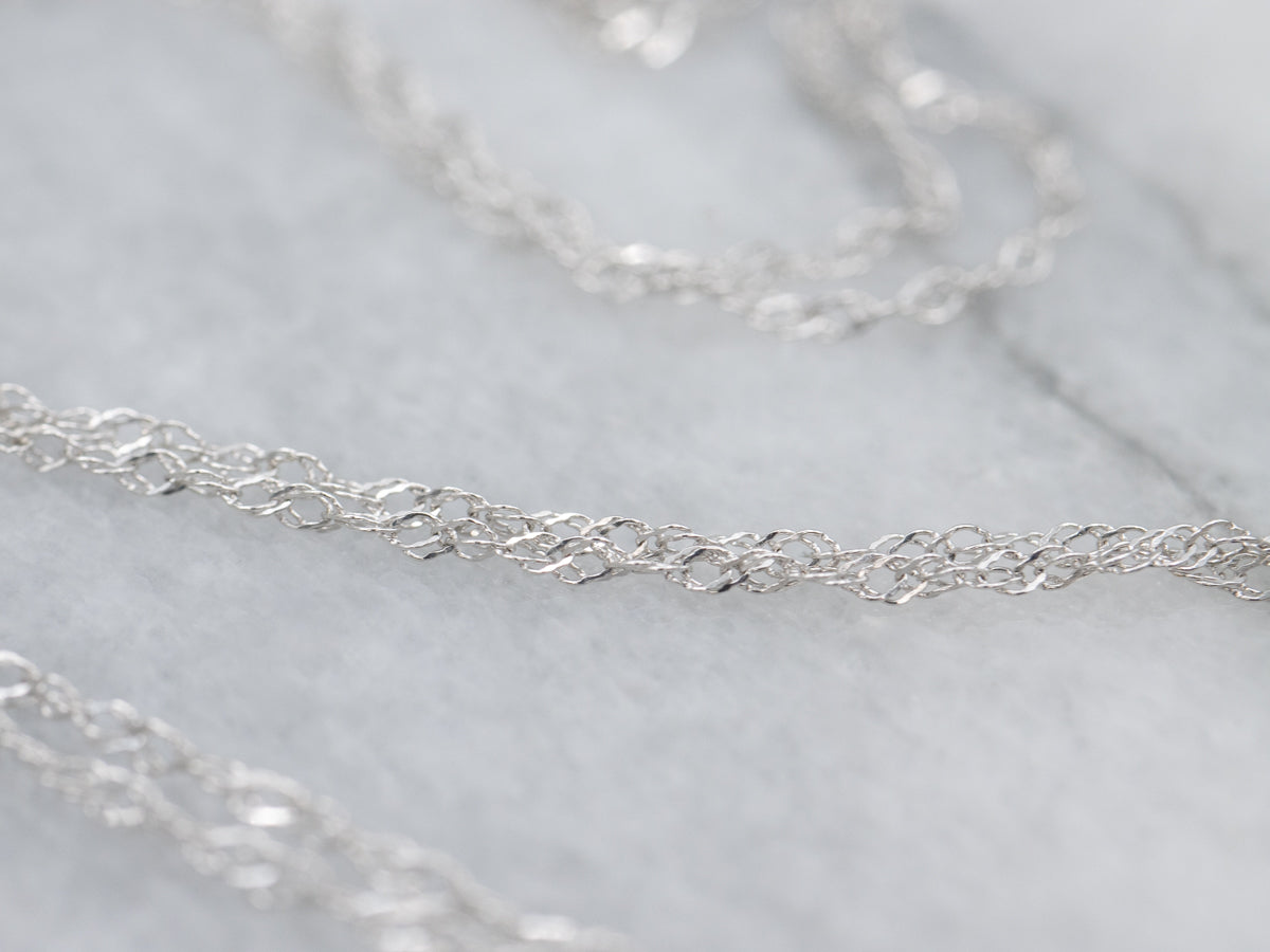 Floral Ruby and Diamond Halo White Gold Pendant Necklace