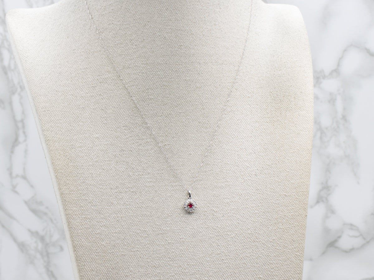 Floral Ruby and Diamond Halo White Gold Pendant Necklace
